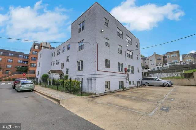 a car parked in front of a building