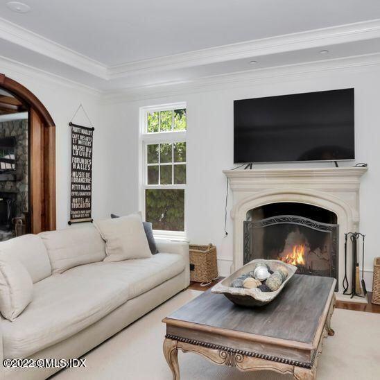211 Orchard Street Cos Cob, CT 06830 - Photo 17 of 40 a living room with furniture fireplace and flat screen tv
