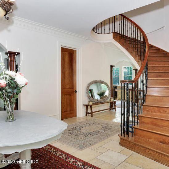 211 Orchard Street Cos Cob, CT 06830 - Photo 7 of 40 a view of entryway livingroom and hall