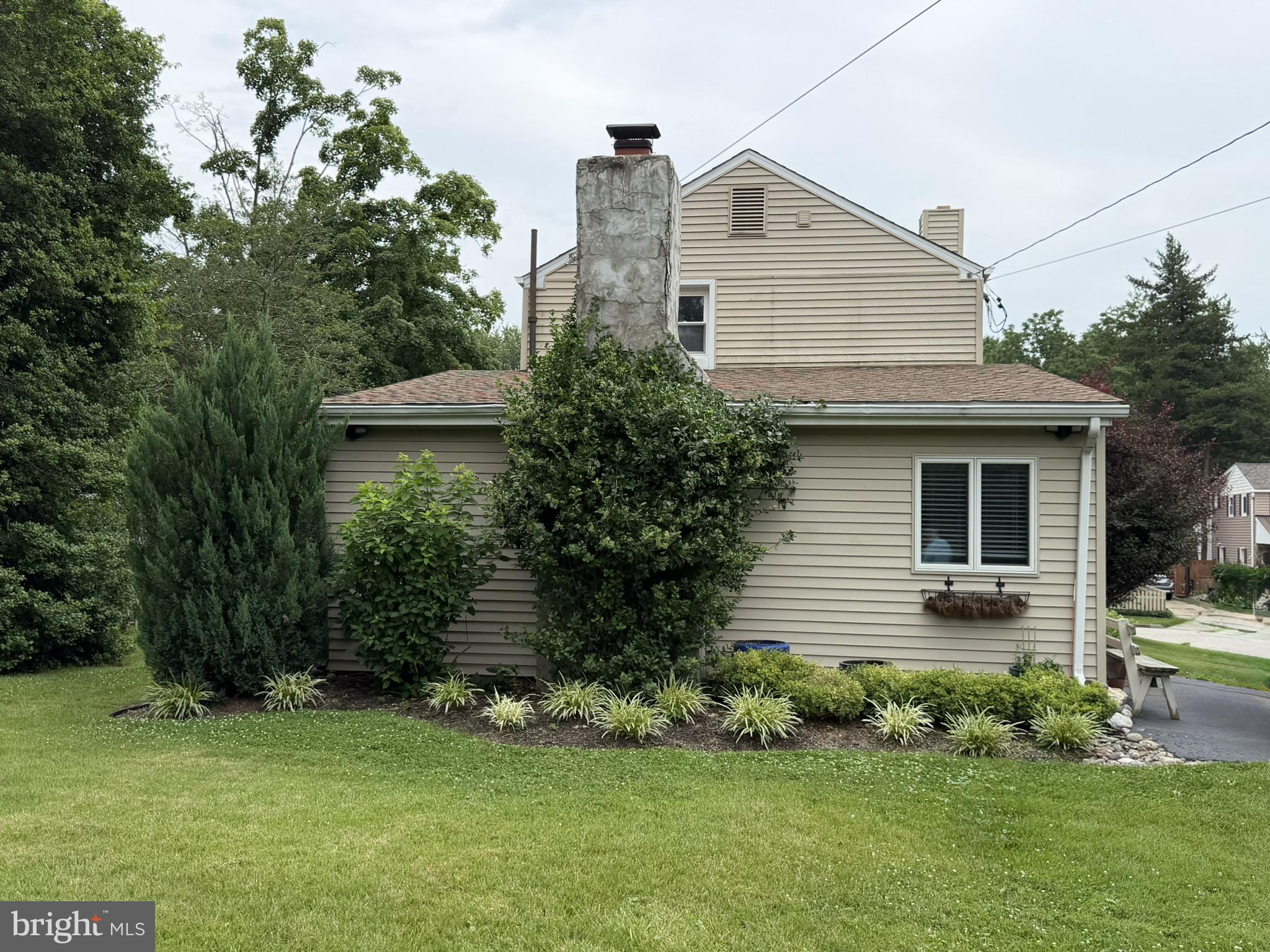 217 Lyster Road Oreland, PA 19075 - Photo 3 of 11 Charming home embraced by greenery.