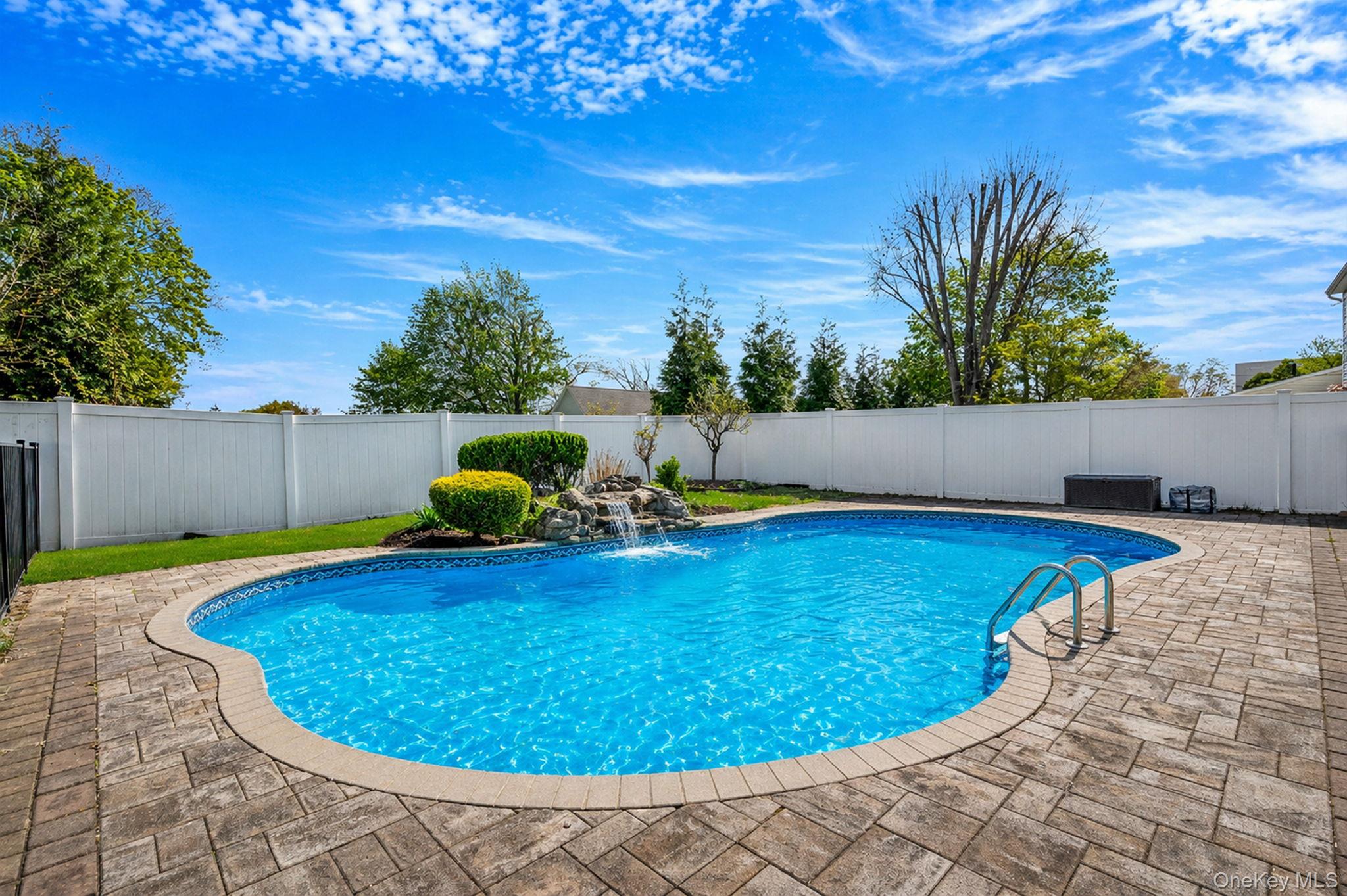 46 Sheldon Place Commack, NY 11725 - Photo 29 of 32 a view of swimming pool with seating space
