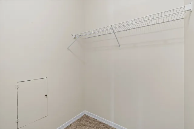 a view of a room with racks on the wall