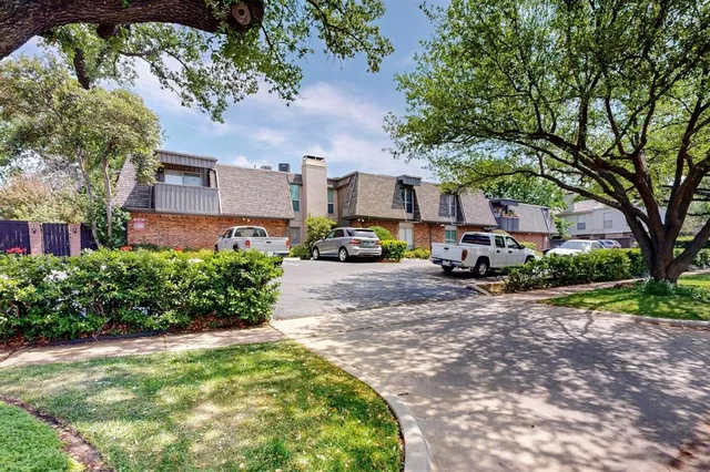 a glass room with furniture