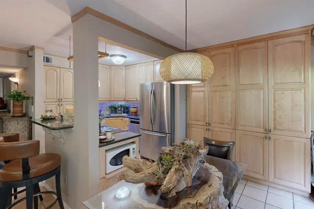 a outdoor living space with furniture and a potted plant