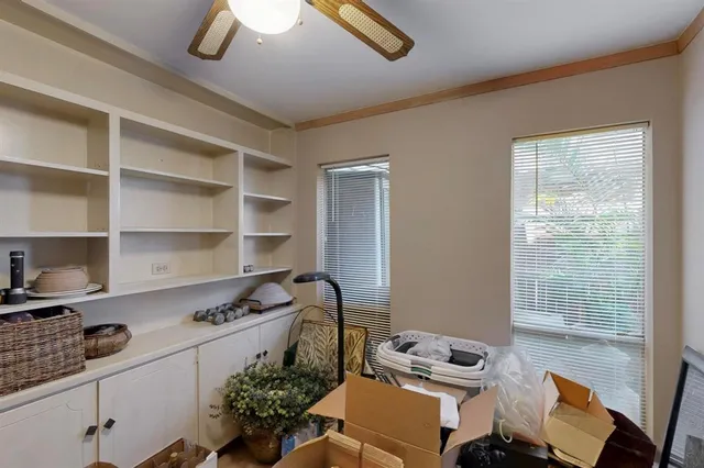 a kitchen with stainless steel appliances a stove a sink and a refrigerator