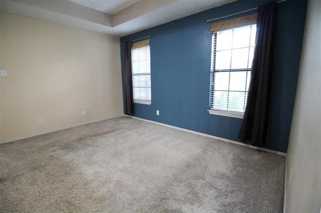 a bathroom with a bathtub sink and mirror