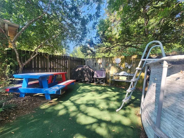 a view of fountain along with trees
