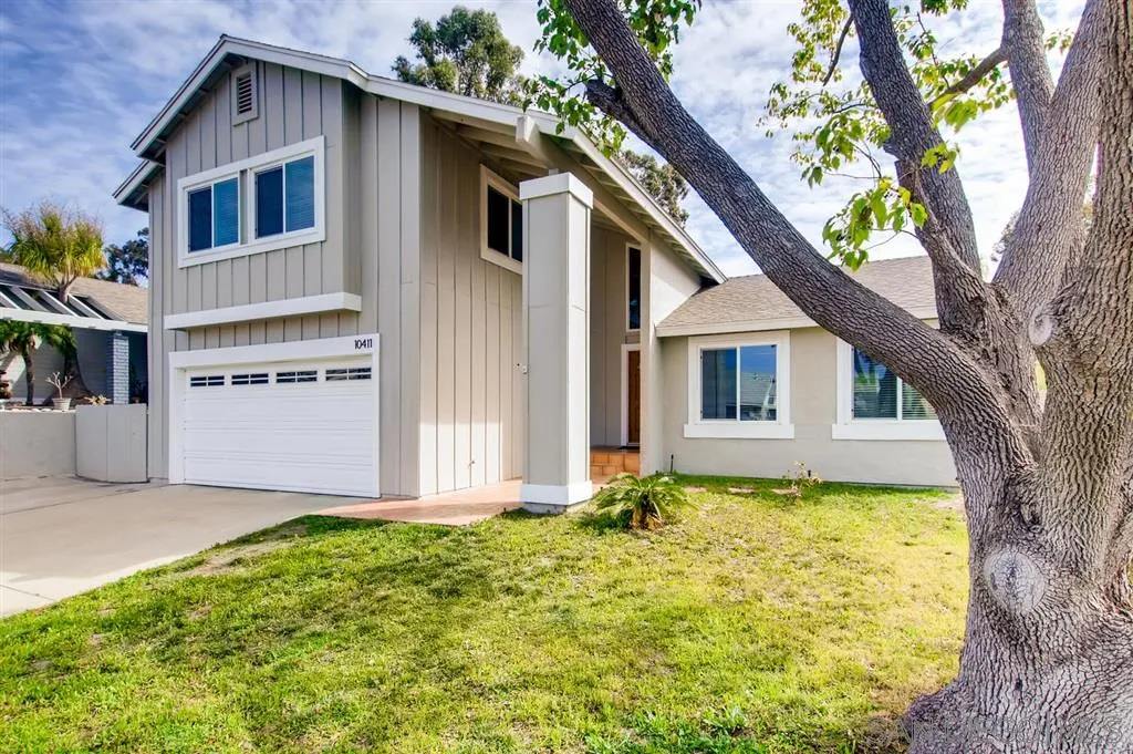 10411 Cadwell Road Santee, CA 92071 - Photo 1 of 25 a front view of a house with garden