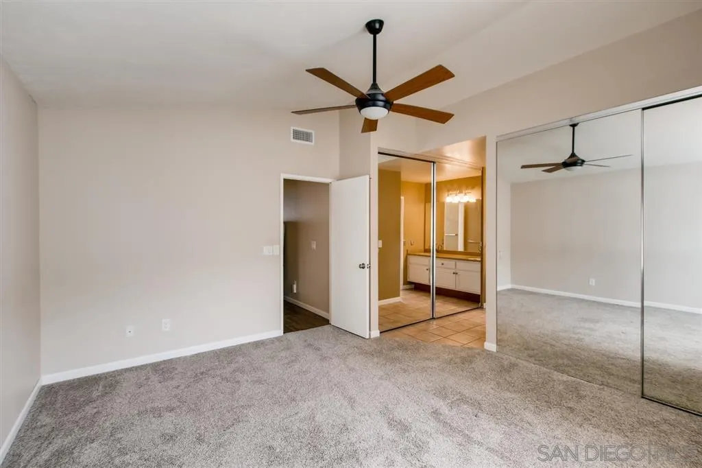 10411 Cadwell Road Santee, CA 92071 - Photo 16 of 25 a view of empty room with wooden floor and fan