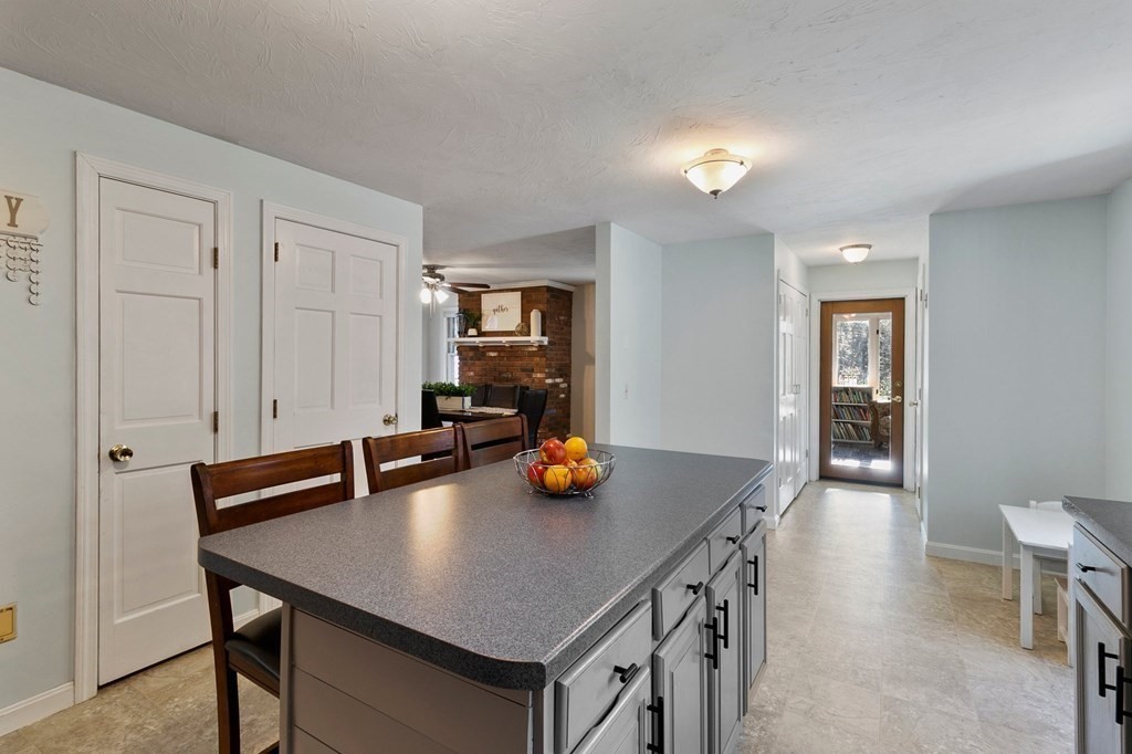 30 Butterworth Road Holland, MA 01521 - Photo 23 of 39 a view of a dining room with furniture and wooden floor