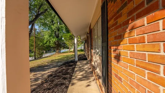 a view of a pathway both side of a building