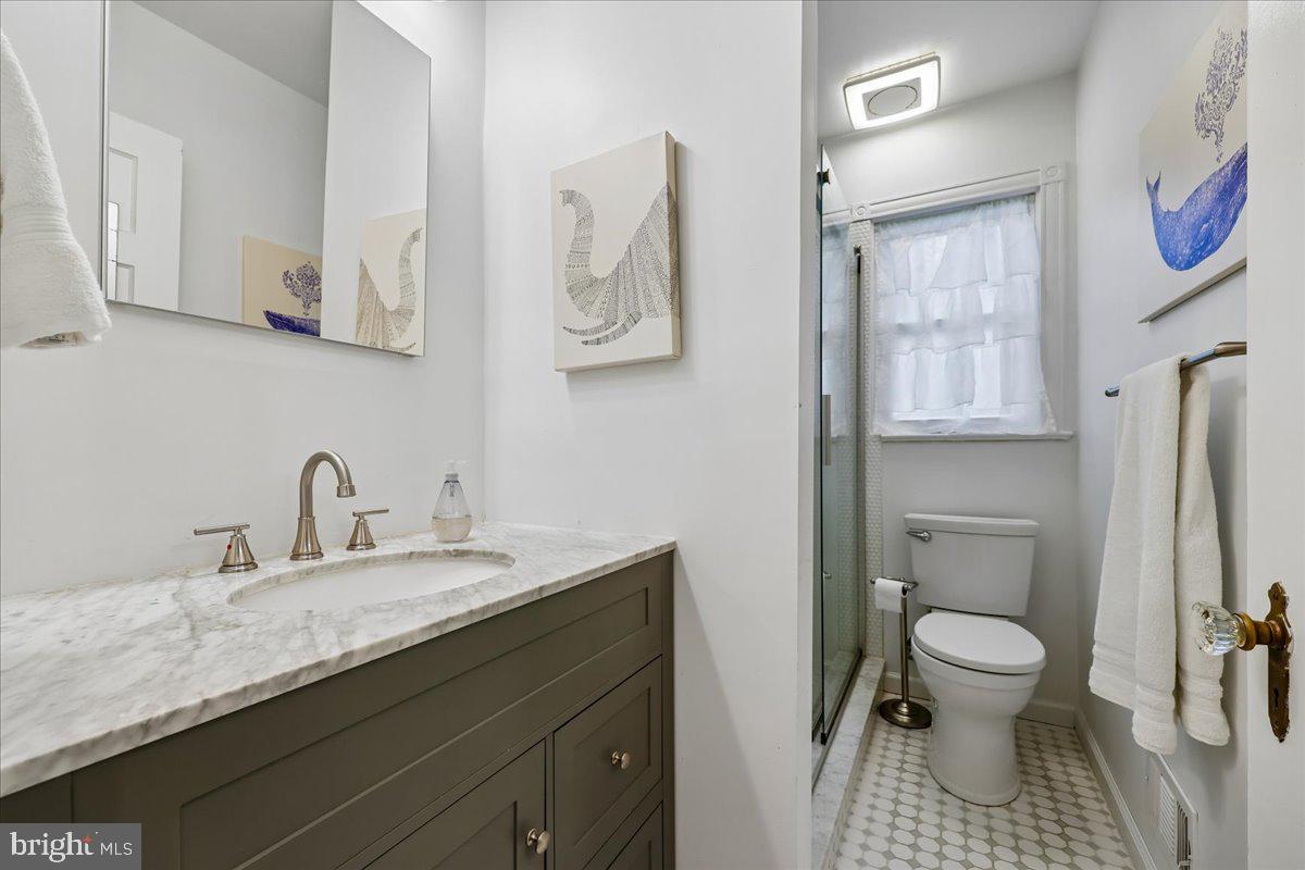 10404 Amherst Avenue Silver Spring, MD 20902 - Photo 22 of 49 Main level renovated bathroom