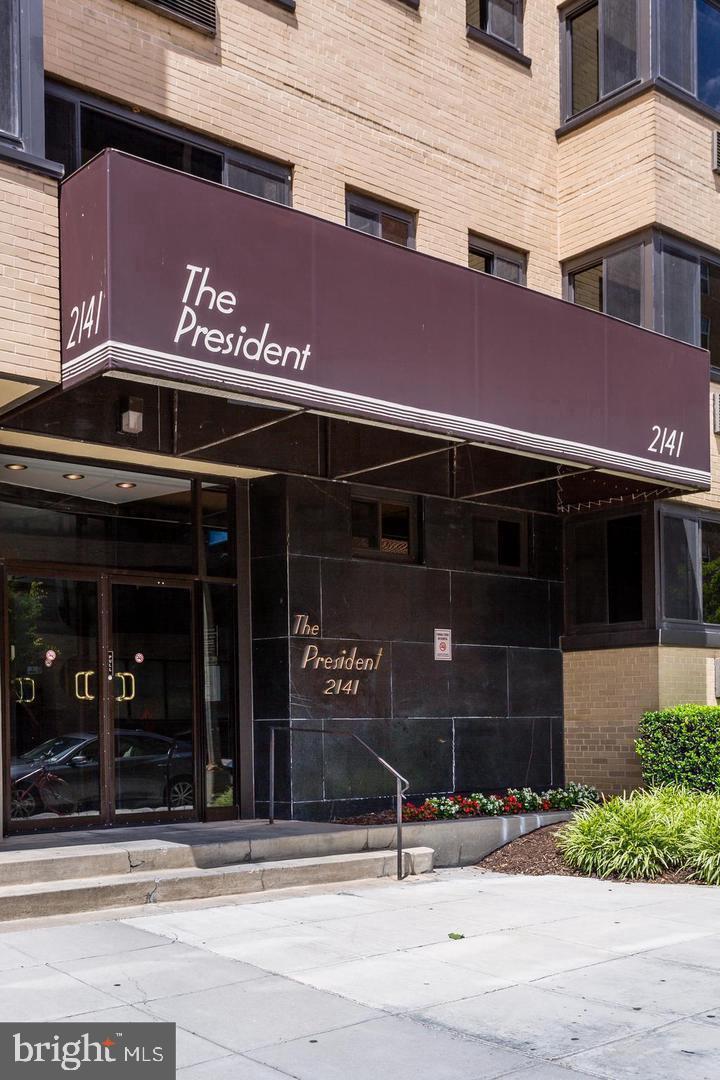 2141 I Street Northwest, Unit 702 Washington, DC 20037 - Photo 16 of 21 a front view of a building with street