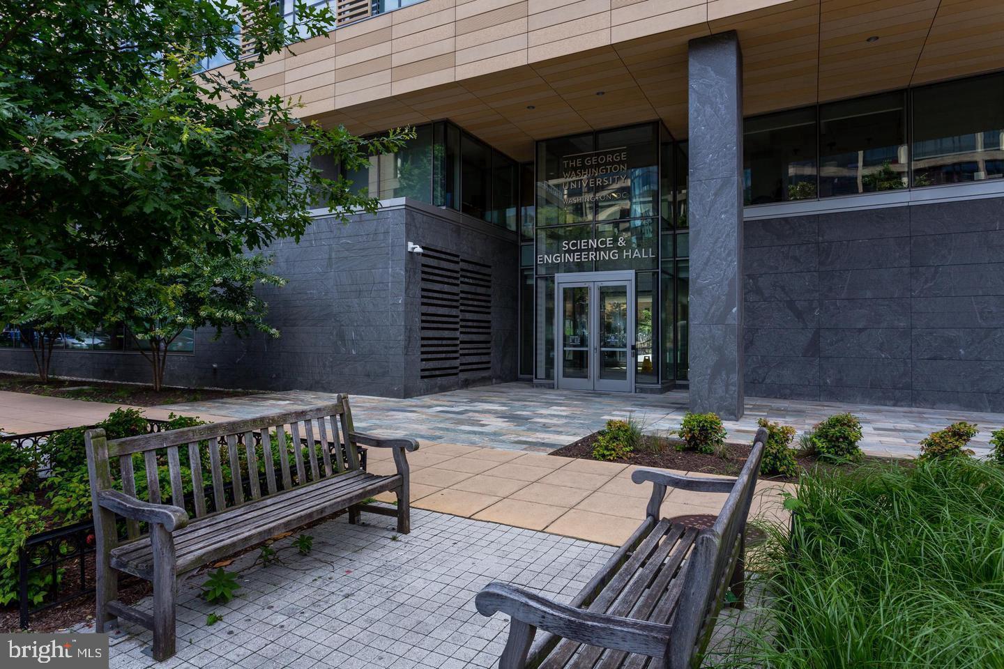 2141 I Street Northwest, Unit 702 Washington, DC 20037 - Photo 20 of 21 a view of a chair and table in backyard of the house