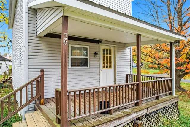 a view of a two chairs on the deck