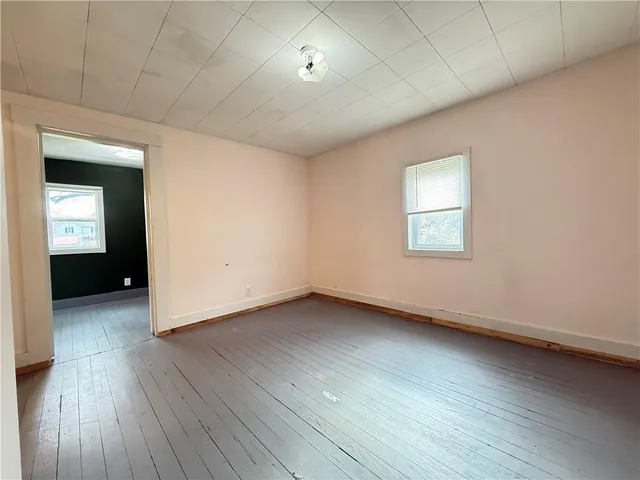 a bathroom with a toilet a sink and bathtub