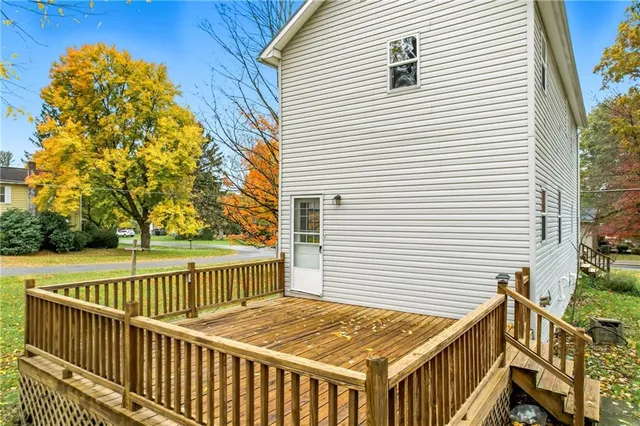 a view of a deck with a yard