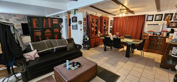 a view of a workspace with furniture