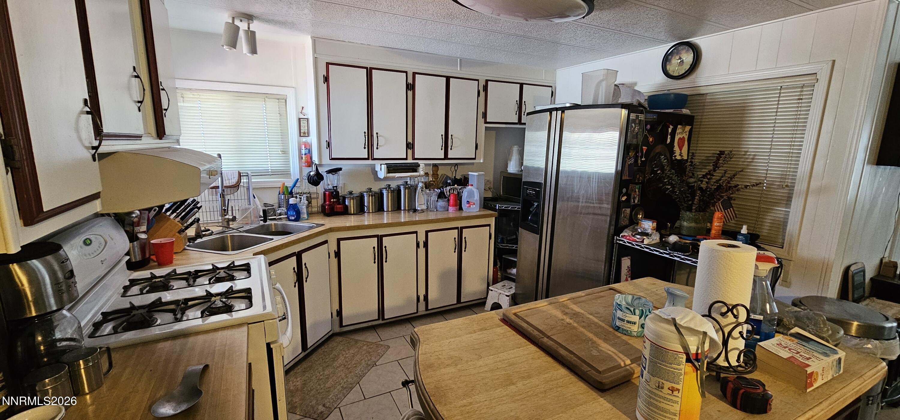 8 Buckhorn Court Kingston, NV 89310 - Photo 20 of 34 a kitchen with stainless steel appliances granite countertop a sink stove and refrigerator