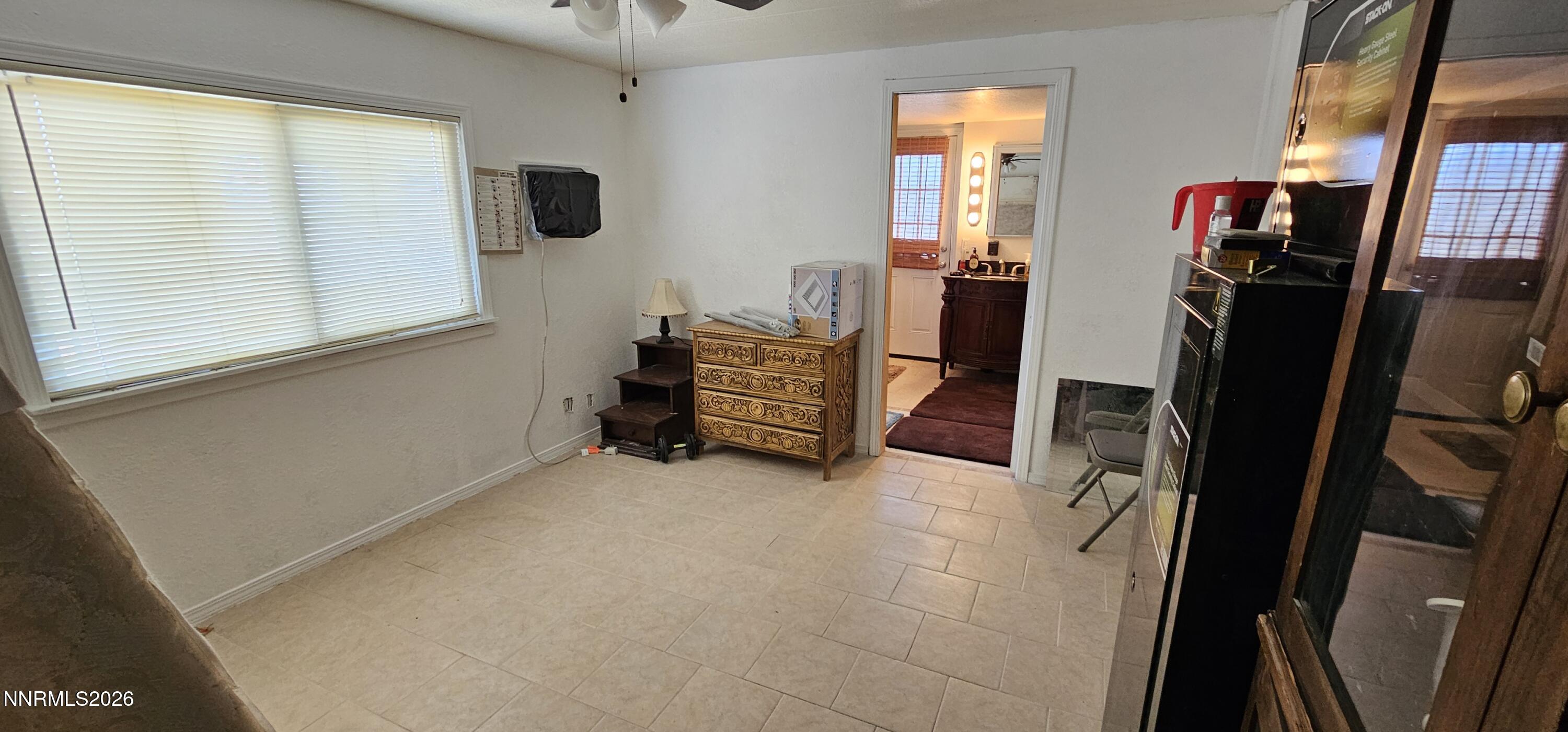 8 Buckhorn Court Kingston, NV 89310 - Photo 30 of 34 a view of an empty room with wooden floor and windows
