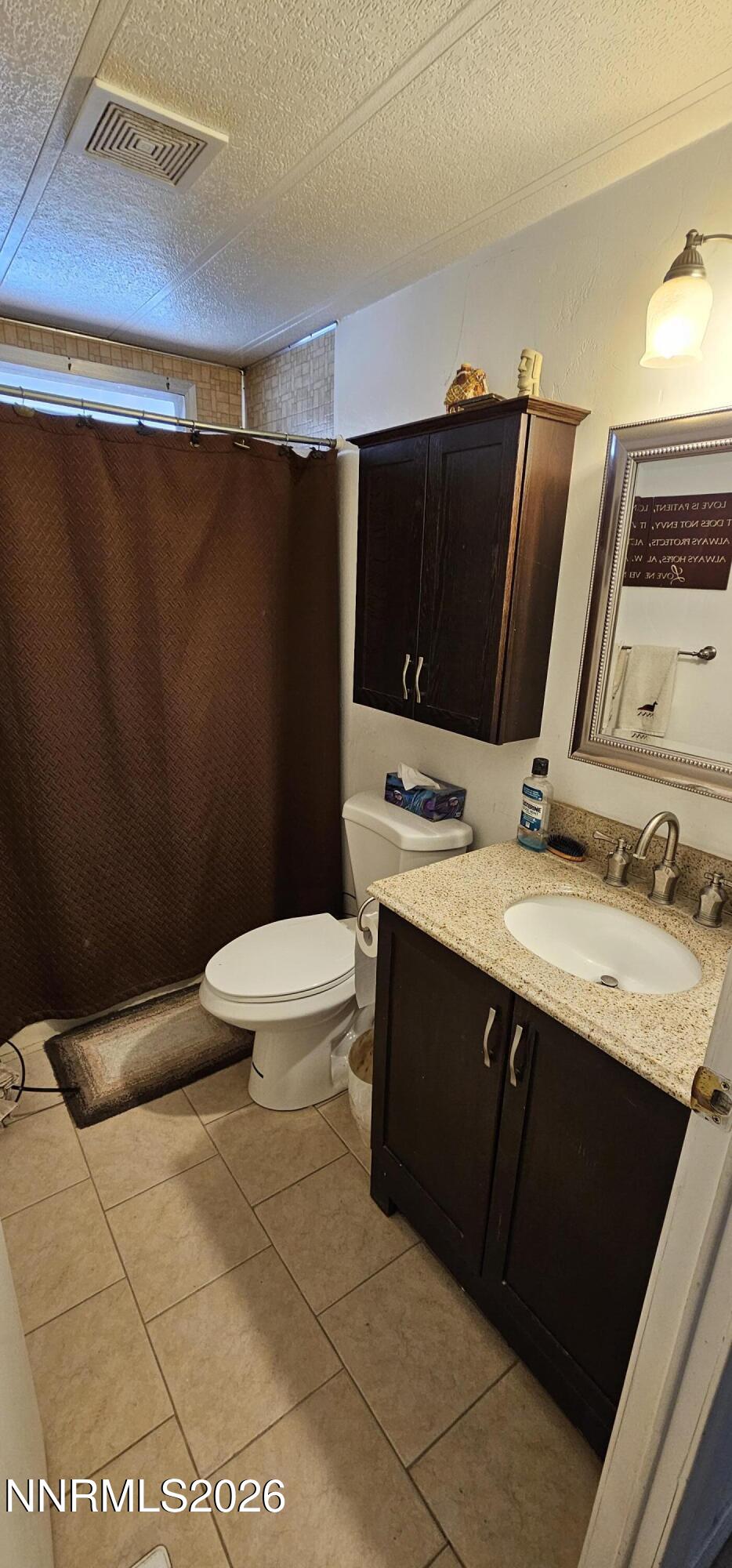 8 Buckhorn Court Kingston, NV 89310 - Photo 33 of 34 a bathroom with a sink and a mirror