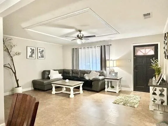 a living room with furniture window and a table