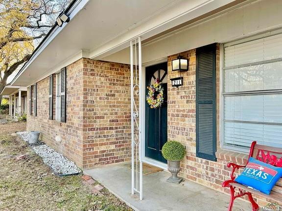 211 Paris Street Longview, TX 75604 - Photo 4 of 15 a view of a building with chairs