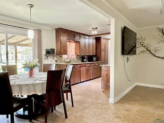211 Paris Street Longview, TX 75604 - Photo 7 of 15 a view of a dining room with furniture window and outside view