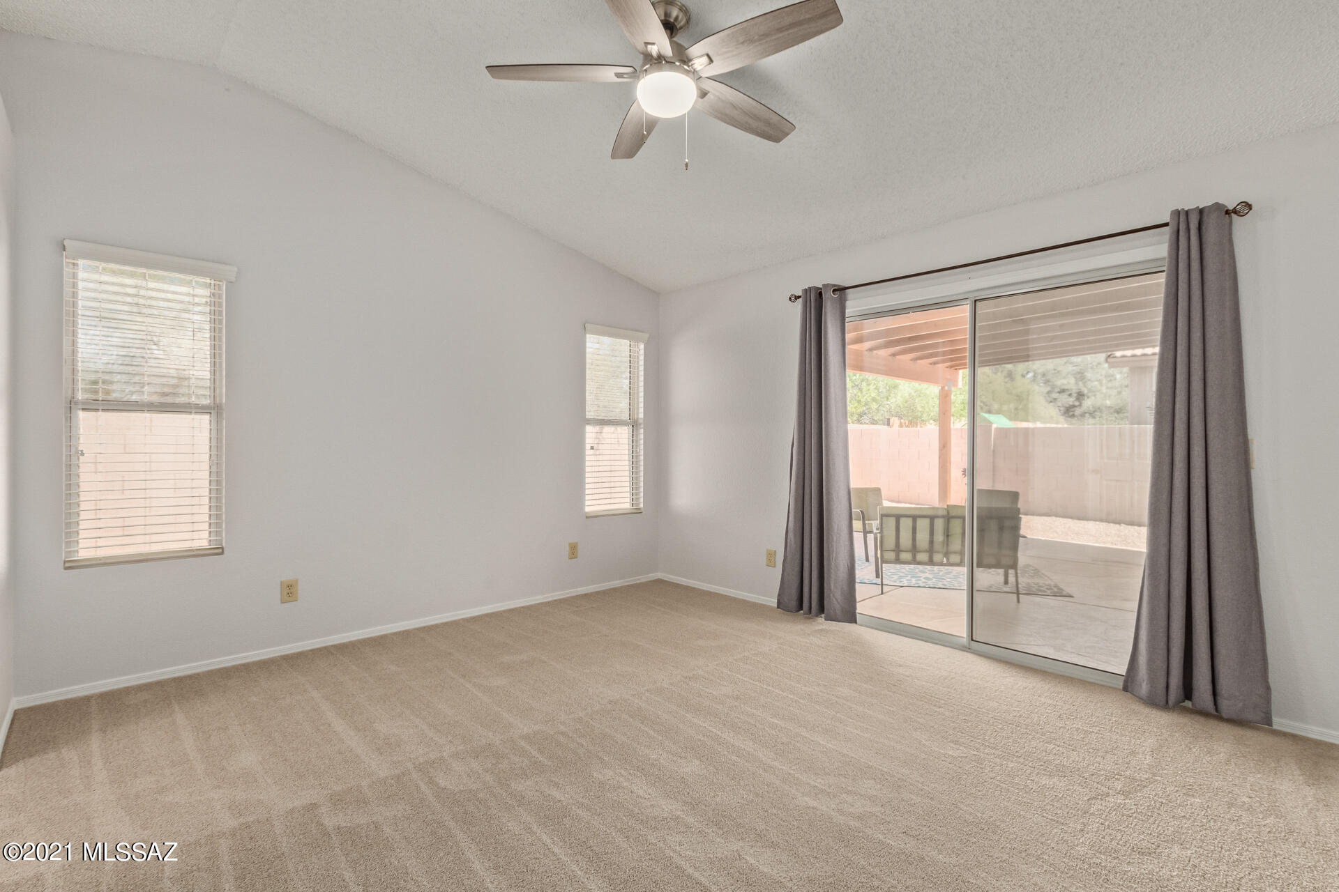 3034 West Sky Ranch Trail Tucson, AZ 85742 - Photo 14 of 27 a view of an empty room with a window