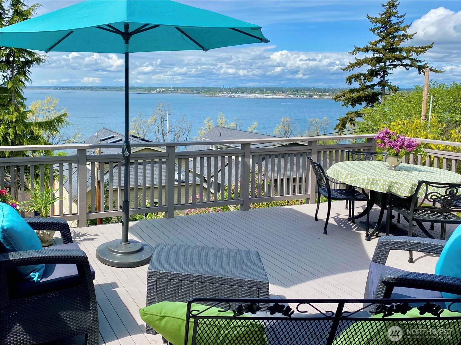 322 South Forest Street Bellingham, WA 98225 - Photo 16 of 34 a view of a balcony with furniture and umbrella
