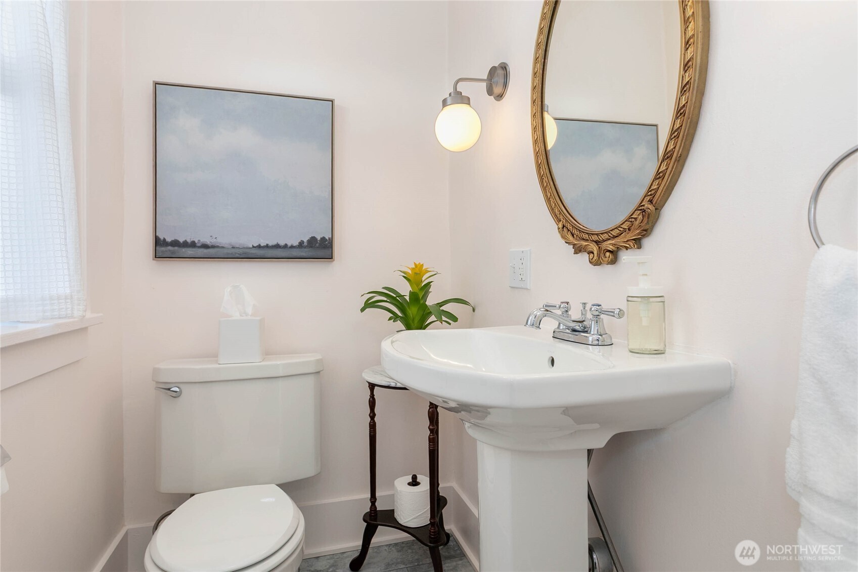 322 South Forest Street Bellingham, WA 98225 - Photo 17 of 34 a bathroom with a toilet a sink and a mirror