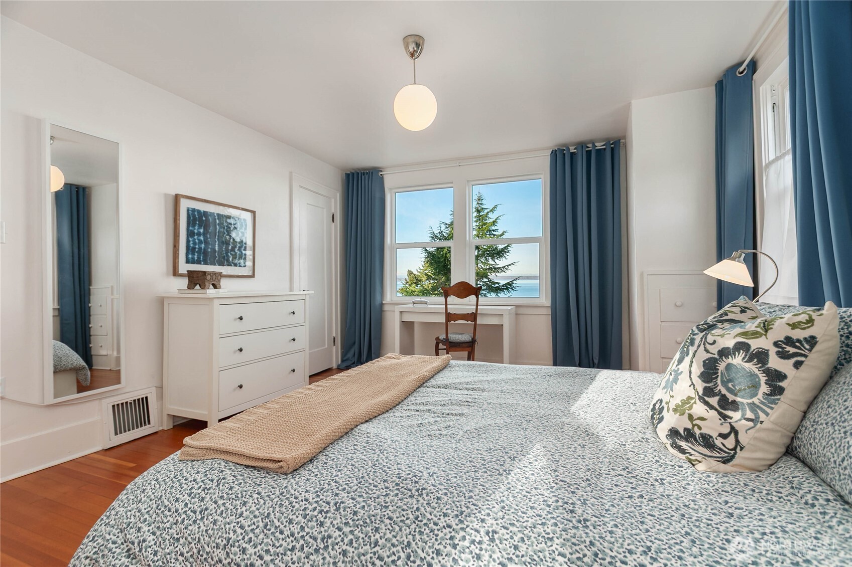 322 South Forest Street Bellingham, WA 98225 - Photo 24 of 34 a bedroom with a bed and a dresser next to a window