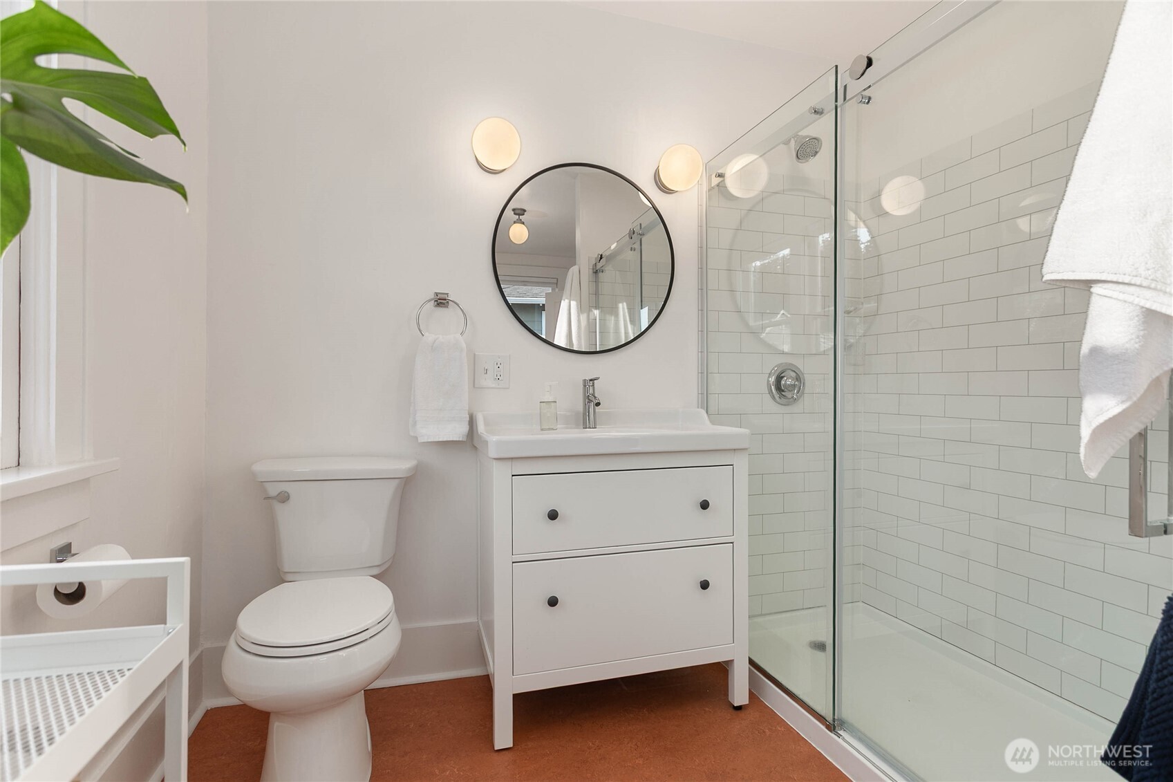 322 South Forest Street Bellingham, WA 98225 - Photo 26 of 34 a bathroom with a toilet sink and mirror