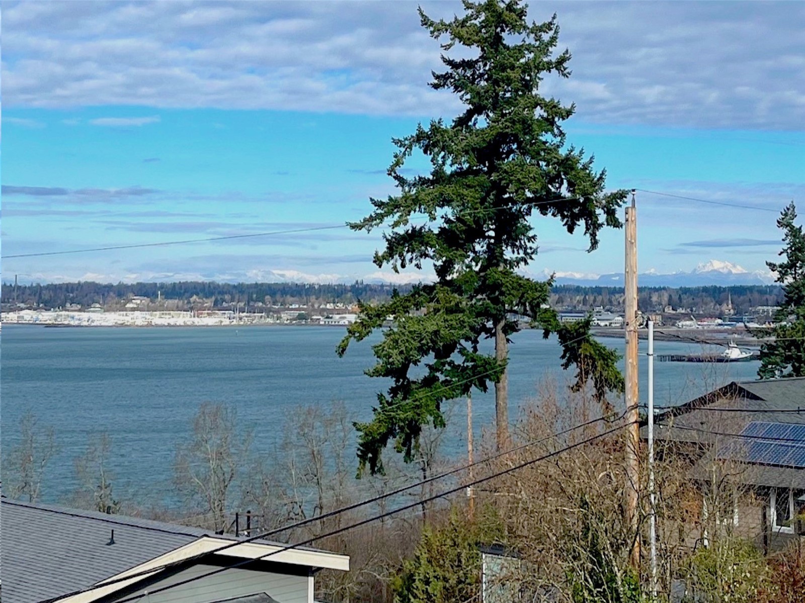 322 South Forest Street Bellingham, WA 98225 - Photo 5 of 34 a view of a lake with a floor to ceiling window