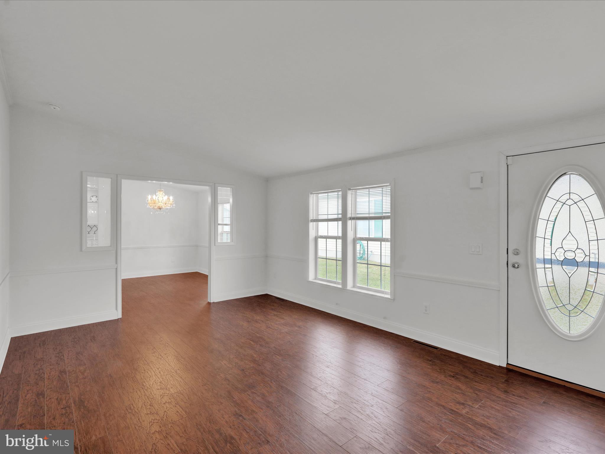 25 Random Road Douglassville, PA 19518 - Photo 13 of 41 an empty room with wooden floor and windows