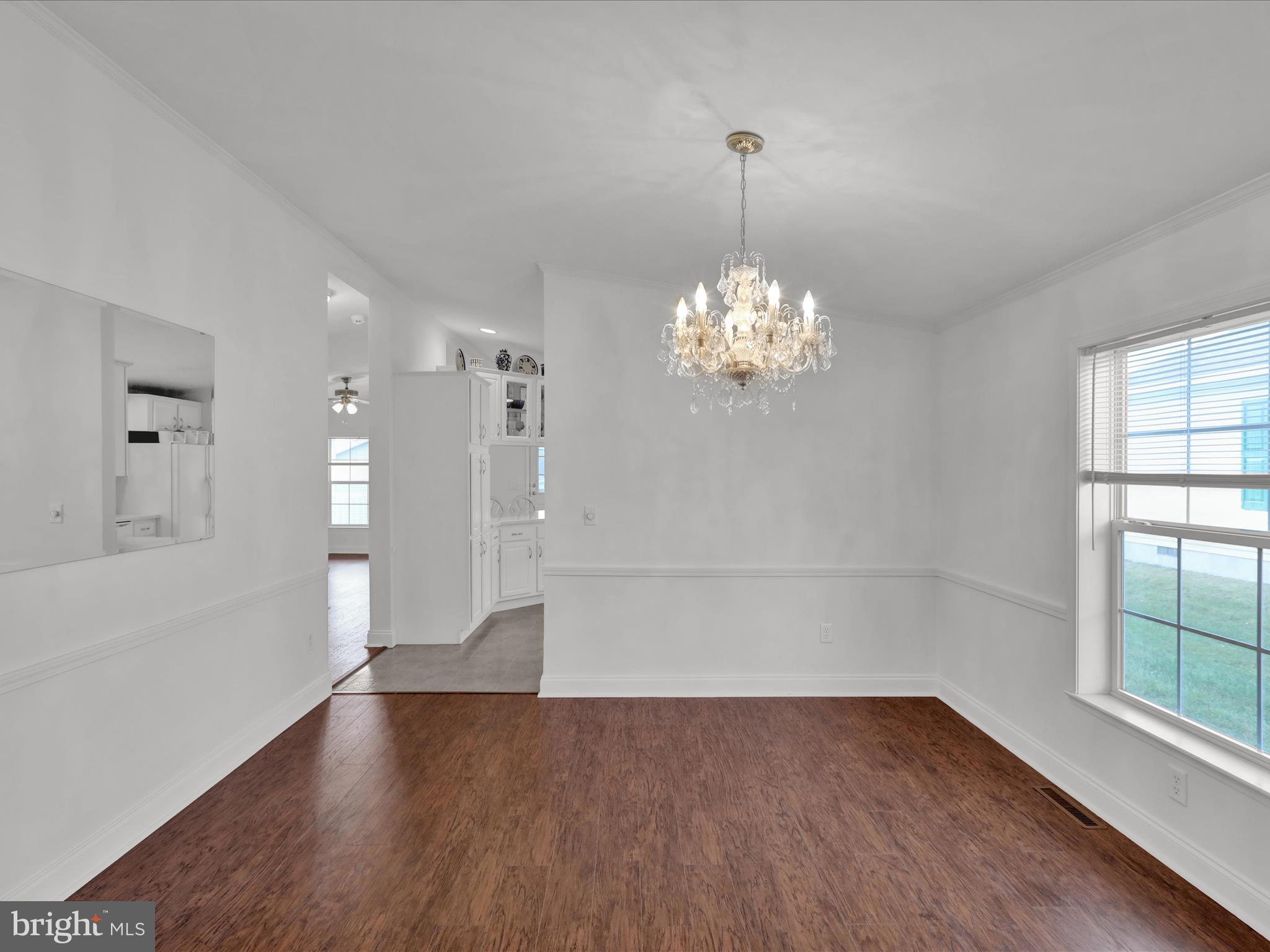 25 Random Road Douglassville, PA 19518 - Photo 14 of 41 a view of an empty room with wooden floor and a window