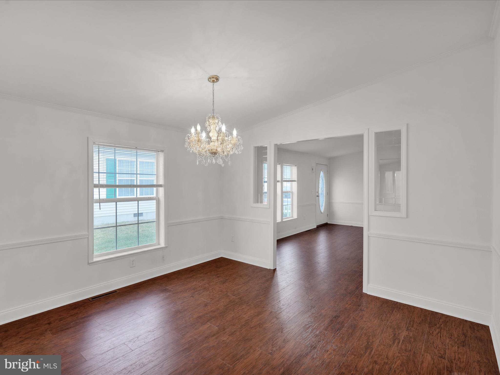 25 Random Road Douglassville, PA 19518 - Photo 15 of 41 a view of an empty room with wooden floor and a window