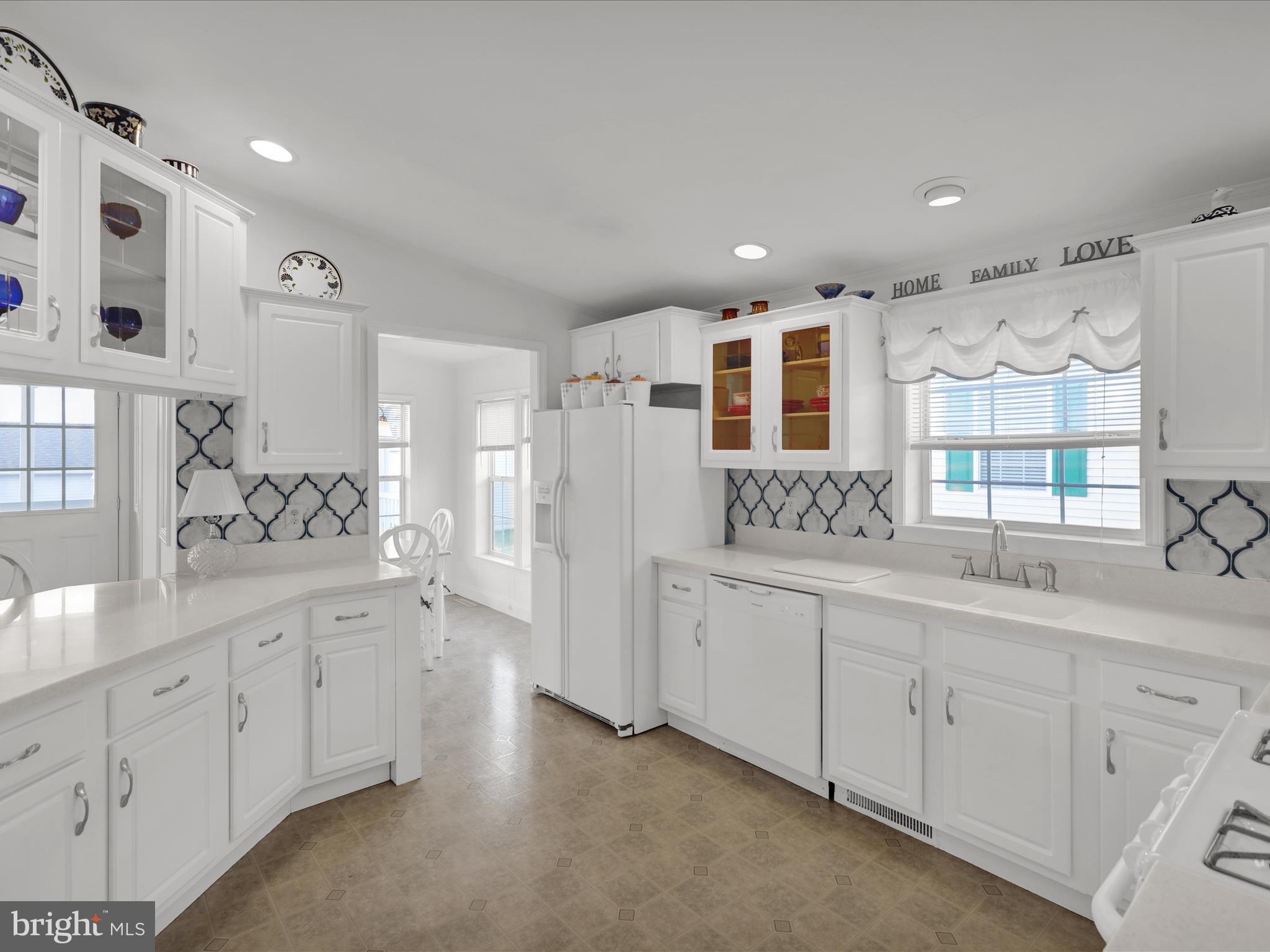 25 Random Road Douglassville, PA 19518 - Photo 19 of 41 a bathroom with a double vanity sink and mirror with shower