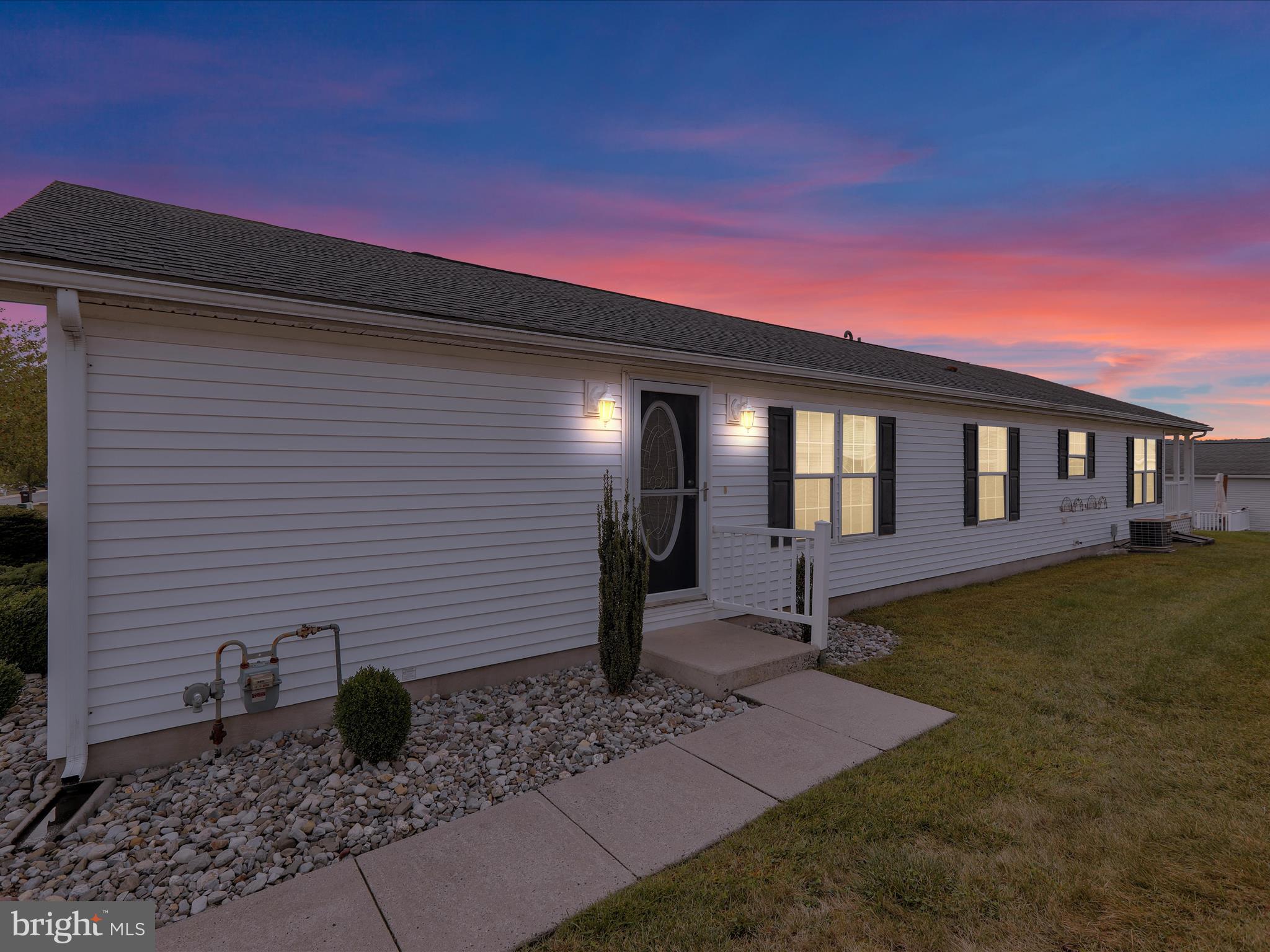25 Random Road Douglassville, PA 19518 - Photo 2 of 41 a front view of a house with garden