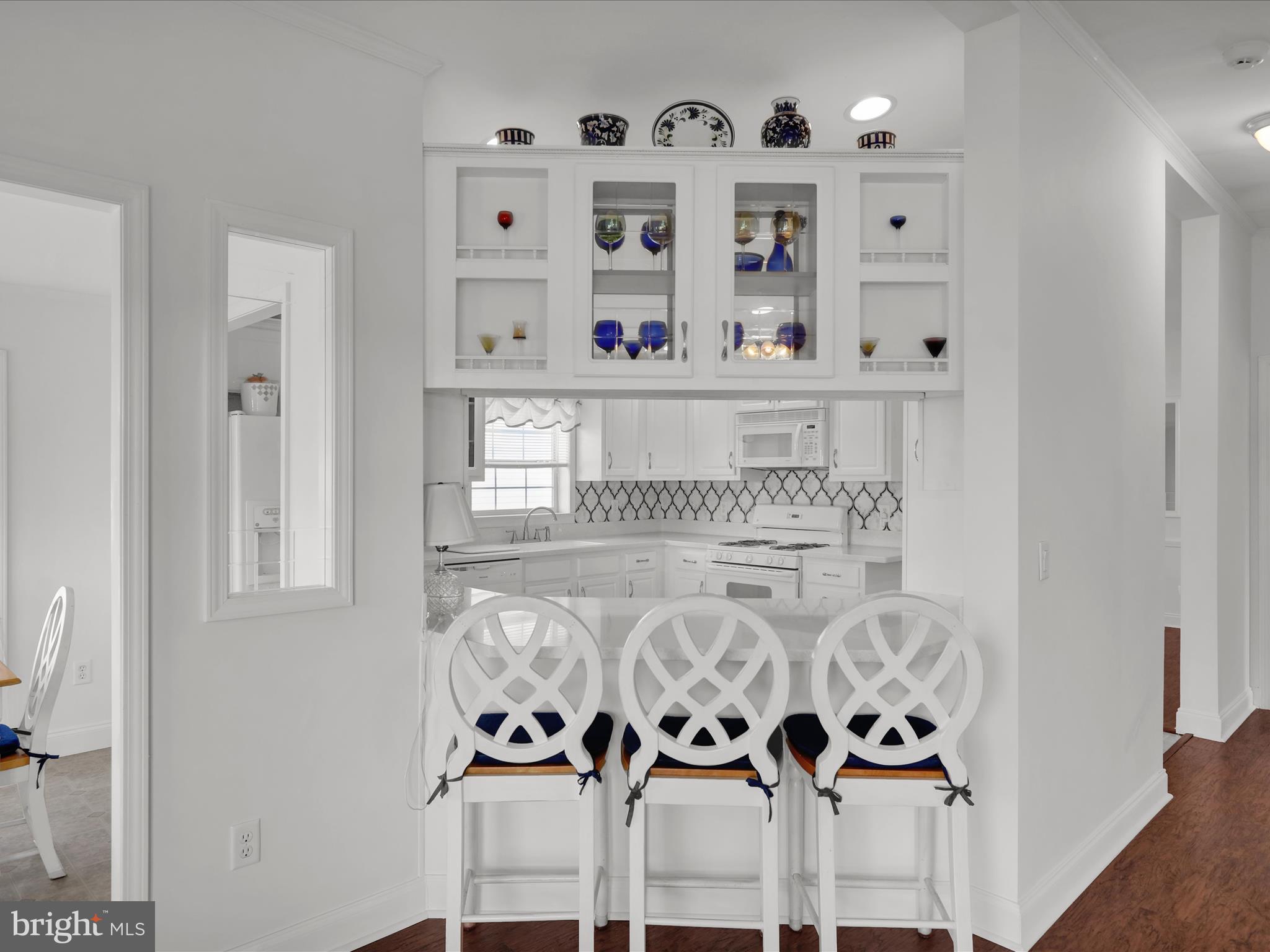25 Random Road Douglassville, PA 19518 - Photo 23 of 41 a view of white cabinet with window and shelf