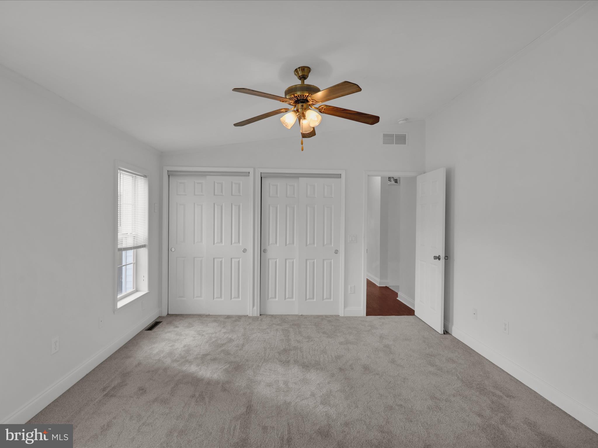 25 Random Road Douglassville, PA 19518 - Photo 35 of 41 a view of a livingroom with a ceiling fan and window