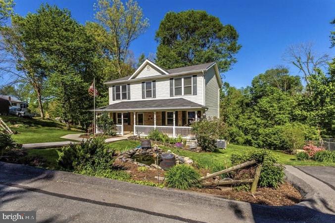 505 4th Avenue Brunswick, MD 21716 - Photo 2 of 54 Charming home embraced by nature.