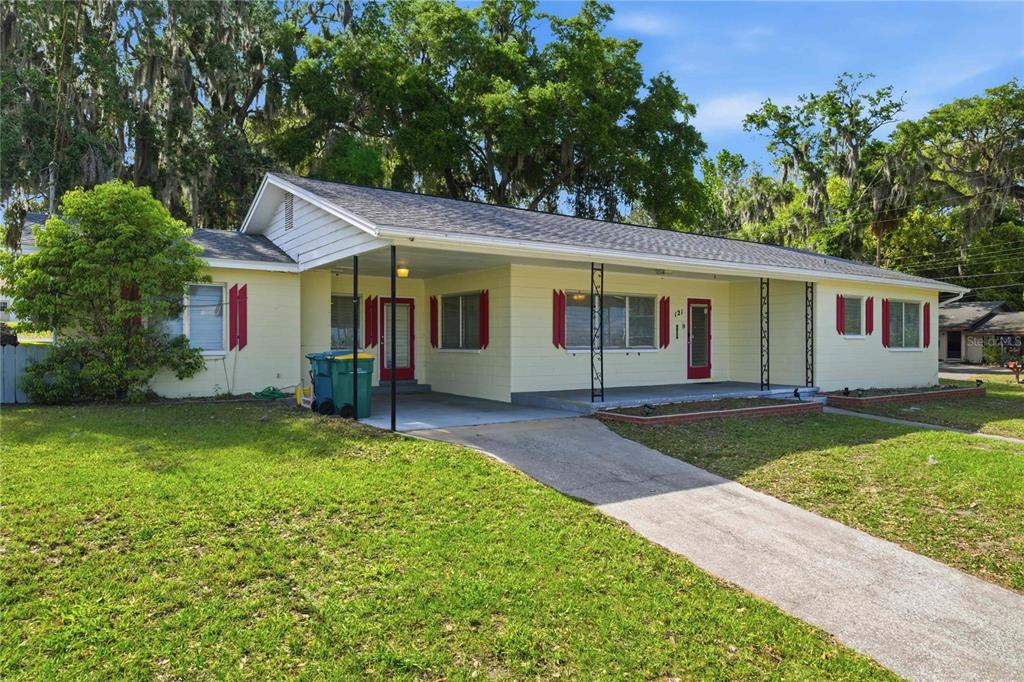 121 North Seminole Avenue Inverness, FL 34450 - Photo 1 of 47 front view of a house with a yard