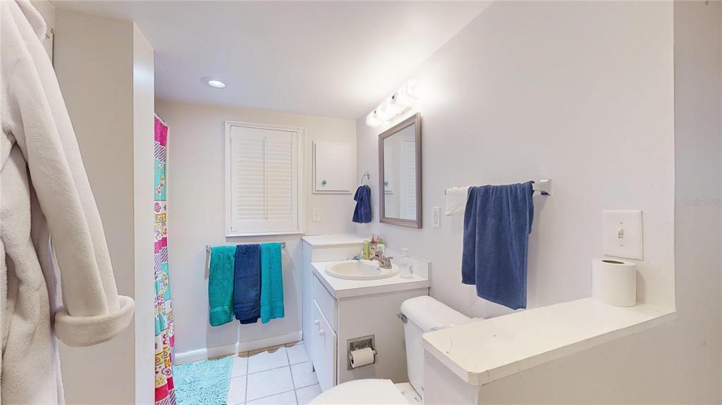 121 North Seminole Avenue Inverness, FL 34450 - Photo 17 of 47 a bathroom with a sink vanity mirror and toilet