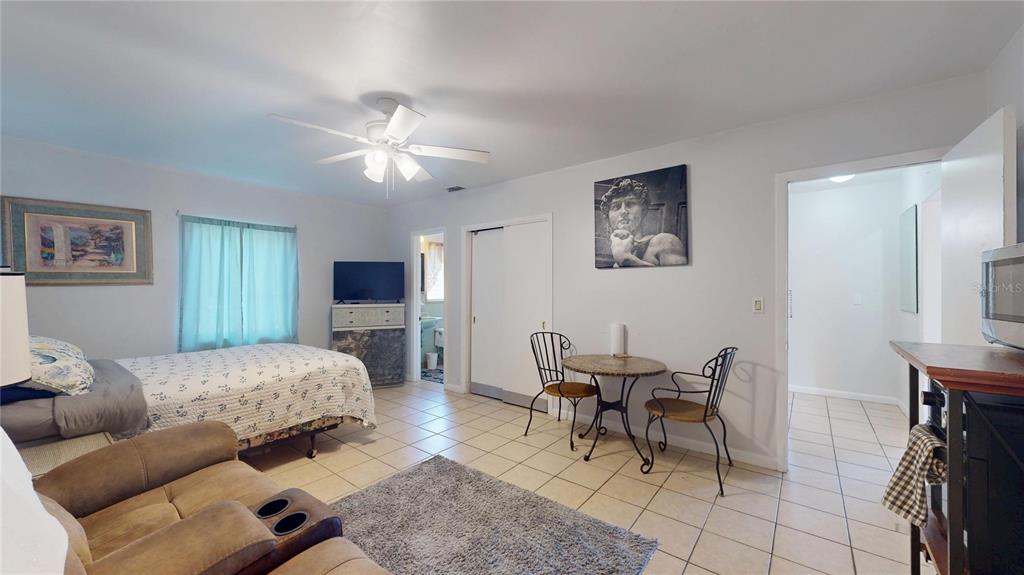 121 North Seminole Avenue Inverness, FL 34450 - Photo 20 of 47 a living room with furniture and a flat screen tv