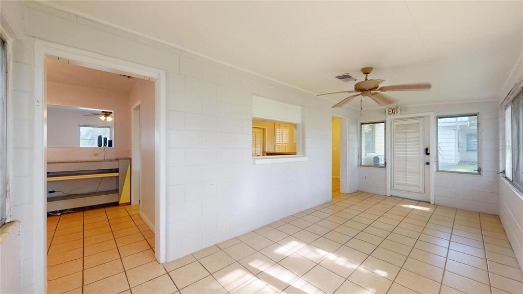 121 North Seminole Avenue Inverness, FL 34450 - Photo 34 of 47 a view of a hallway view with wooden floor and staircase