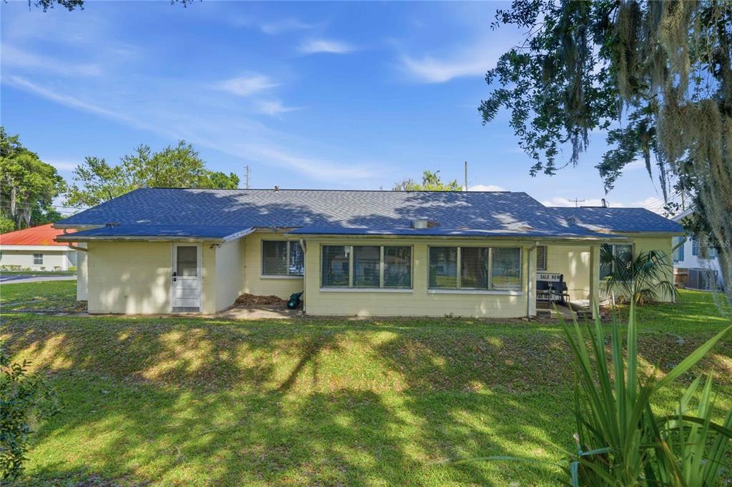 121 North Seminole Avenue Inverness, FL 34450 - Photo 44 of 47 a front view of a house with a garden