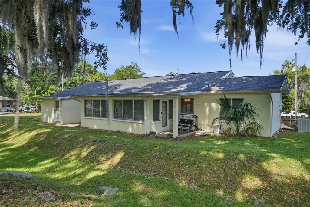 121 North Seminole Avenue Inverness, FL 34450 - Photo 45 of 47 a view of a house with a yard and sitting area