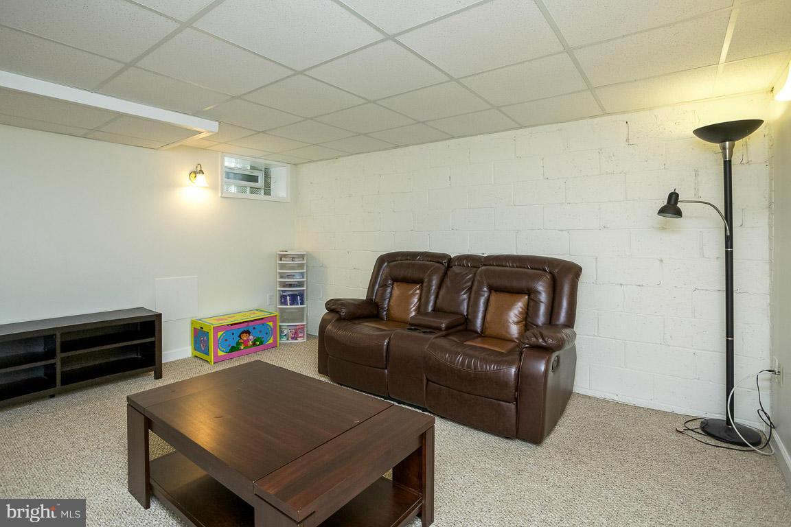 8318 Edgedale Road Baltimore, MD 21234 - Photo 26 of 30 Natural light filters into the basement