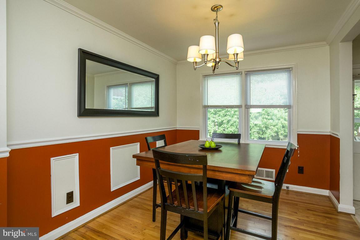 8318 Edgedale Road Baltimore, MD 21234 - Photo 6 of 30 Chair rail and picture framing add nice touches